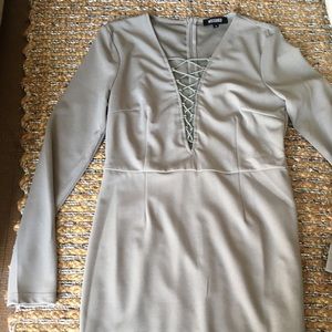 Gray crepe lace up fitted dress.
